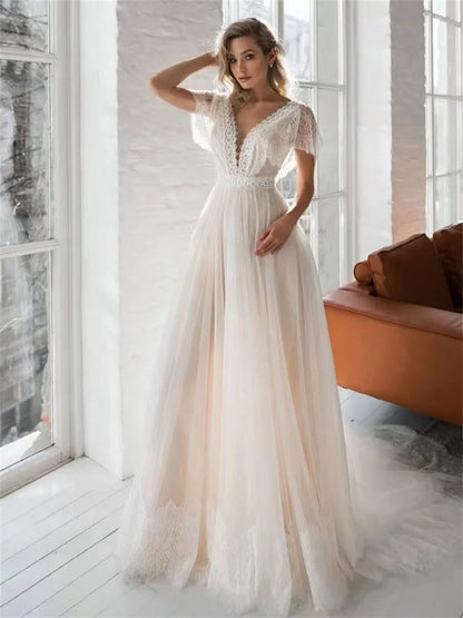 Bohemian Wedding Dresses Lace Appliques V-Neck Cap Sleeves Backless Tulle Sweep Train Beach Bridal Gowns Vestidos De Novia