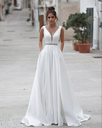 Vestidos de noiva elegantes de cetim com bolsos V -Boletes A -Line Open Back Bridal Party Swee