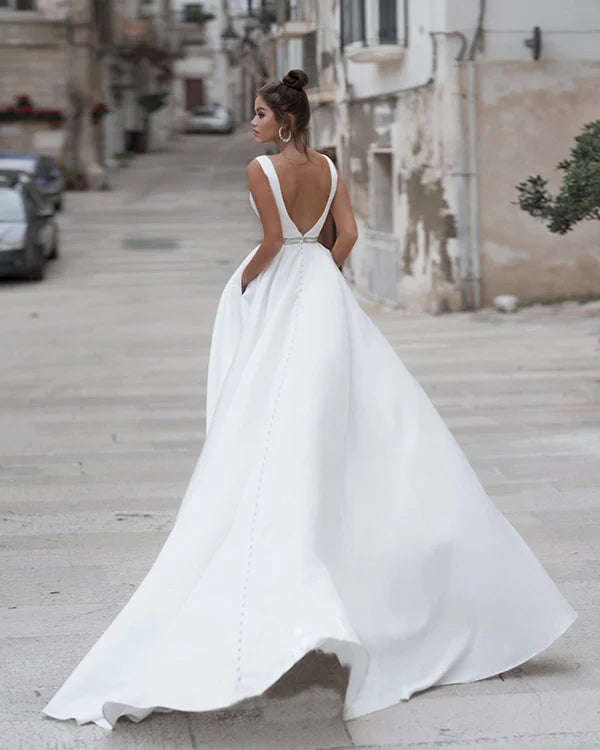 Vestidos de noiva elegantes de cetim com bolsos V -Boletes A -Line Open Back Bridal Party Swee