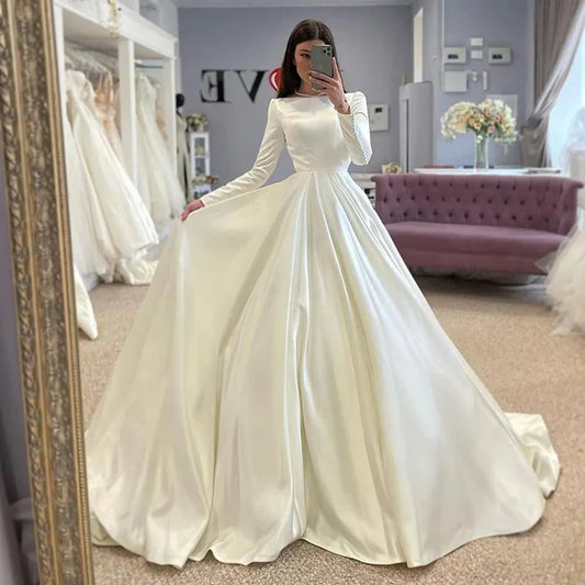 Prinzessin Brautkleider Ein Linie Boot Hals Brautkleider Langarm Elegante Satin -Hochzeitsfeierkleider mit romantischen Knöpfen