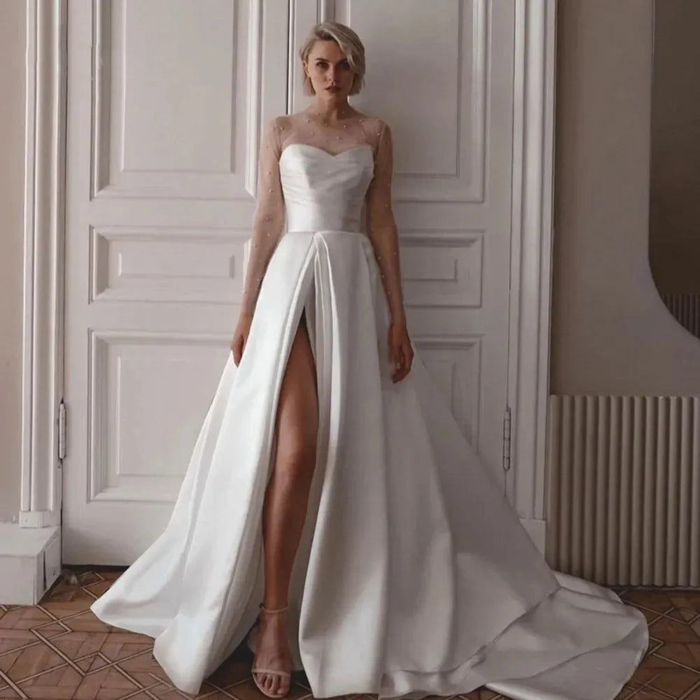 Najnowsza satyna sukienka ślubna Linia Długie rękaw z perłami High Slit Bride sukienka Illusion Back Robe de Mariee