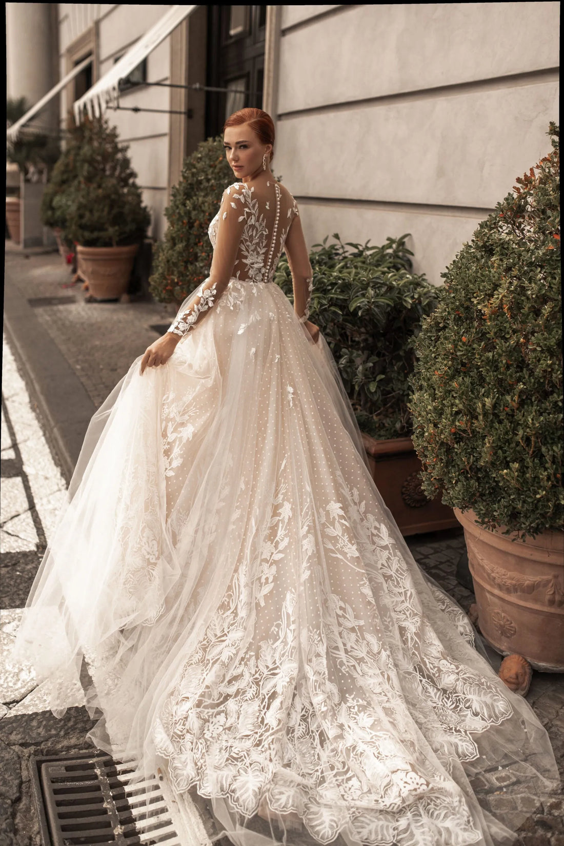 Ethereal A-Line Wedding Gown with Illusion Sleeves, Button Detailing, and a Romantic Puffy Silhouette Satin