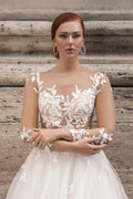 Ethereal A-Line Wedding Gown with Illusion Sleeves, Button Detailing, and a Romantic Puffy Silhouette Satin
