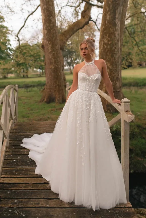 Elegant A-Line Wedding Dress with Halter Neckline, Open Shoulders, and Pearl Embellishments Satin