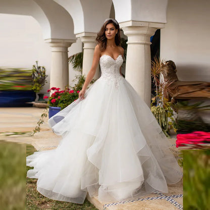 Vestido de novia de lujo con escote en forma de corazón y Apliques de encaje, corpiño con cuentas y lentejuelas de princesa con espalda descubierta, vestido de novia de Organza hinchado