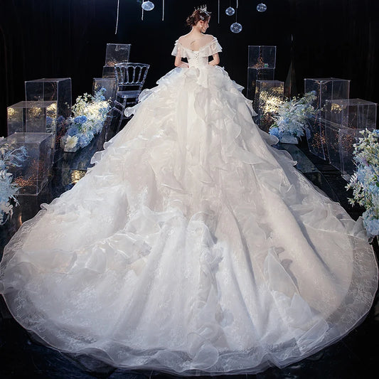 Vestido de novia Gryffon, vestido de novia de encaje de lujo con tren, vestido de baile clásico con manga casquillo, vestidos de princesa más personalizados