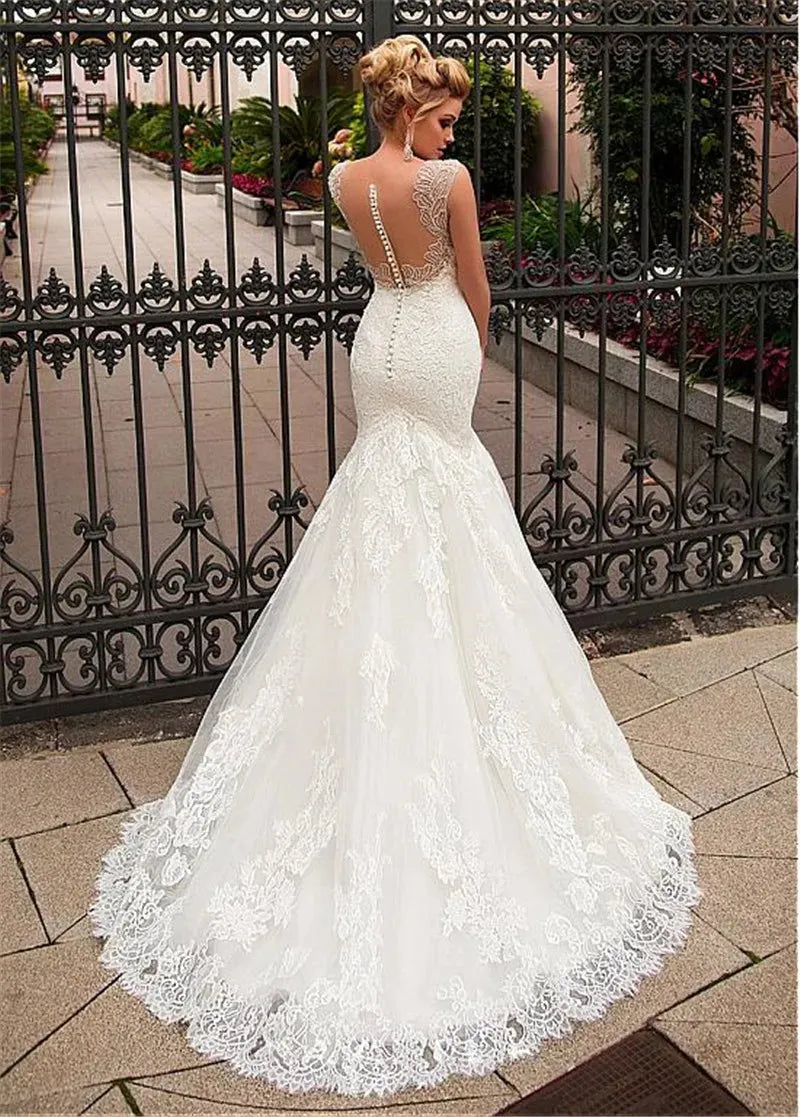 Sheer Mermaid Lace Appliques Slim Women Wedding Dresses Natural With Buttons Back Bridal Gowns Formal Long Robe De Mariee Champagne