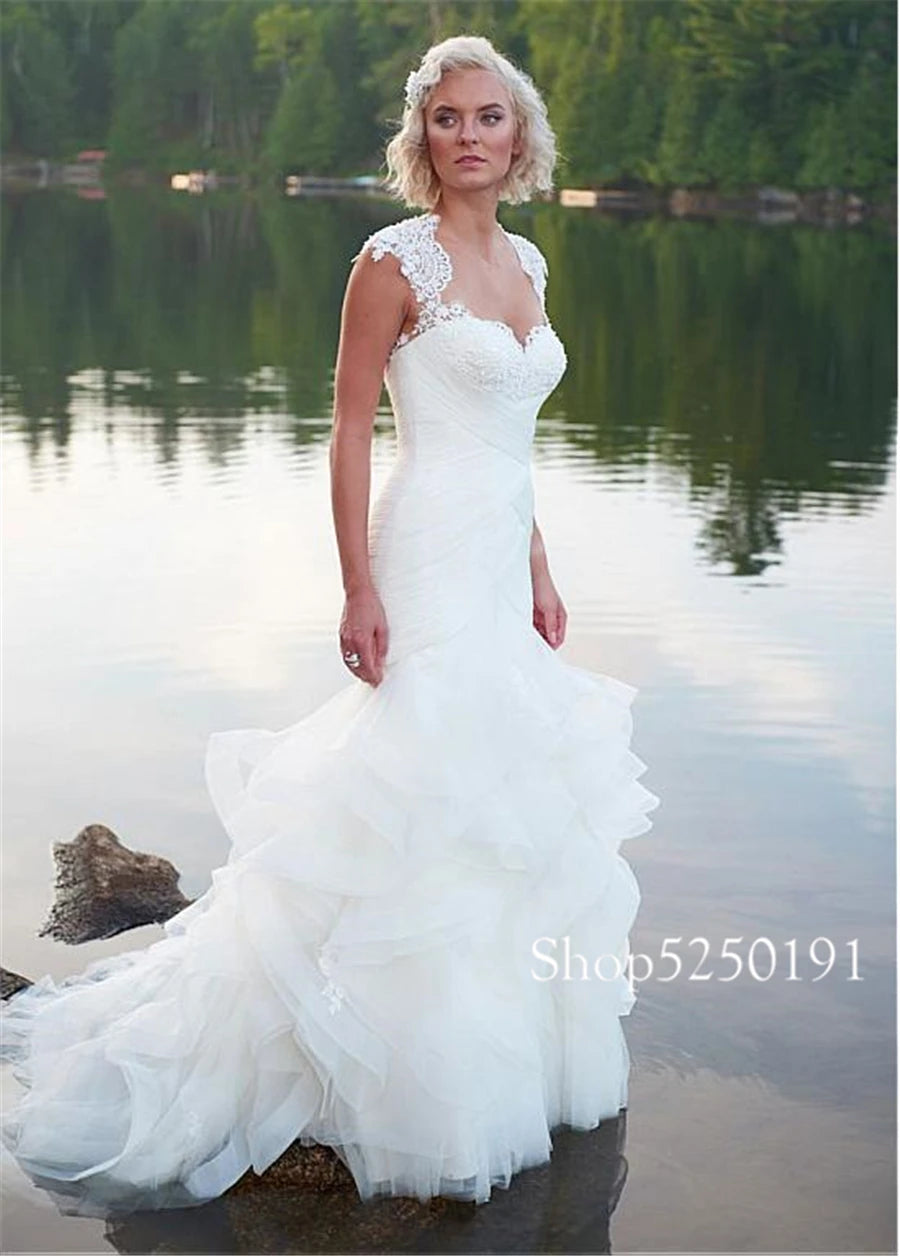 Exquisite Crisscross Ruched Bodice Sweetheart Neckline Mermaid Wedding Dress Cap Sleeves Ruffled Organza Beach Bridal Gowns