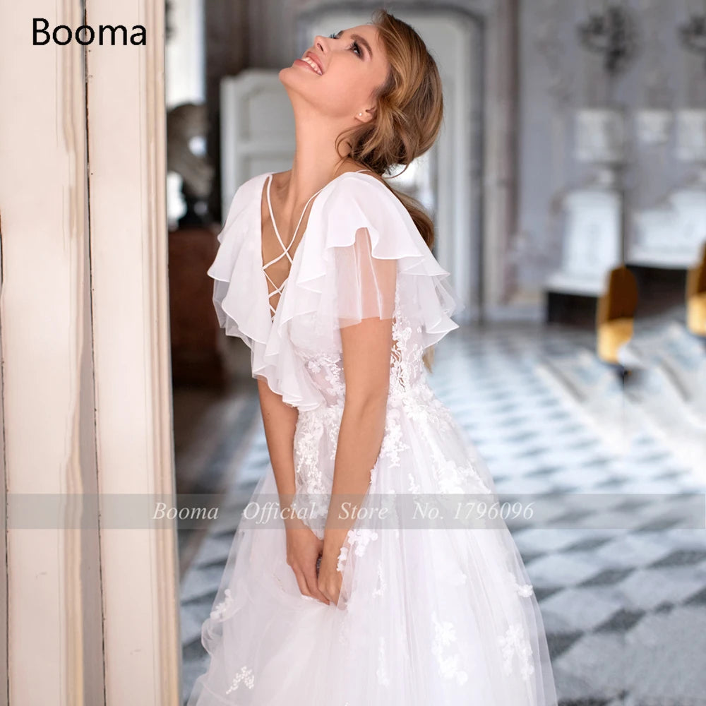 Menggelangkan gaun pengantin V-neck Ruffles Criss Cross Illusion A-Line Bride Dresses Backless Lace Appliques Gaun Pengantin Panjang