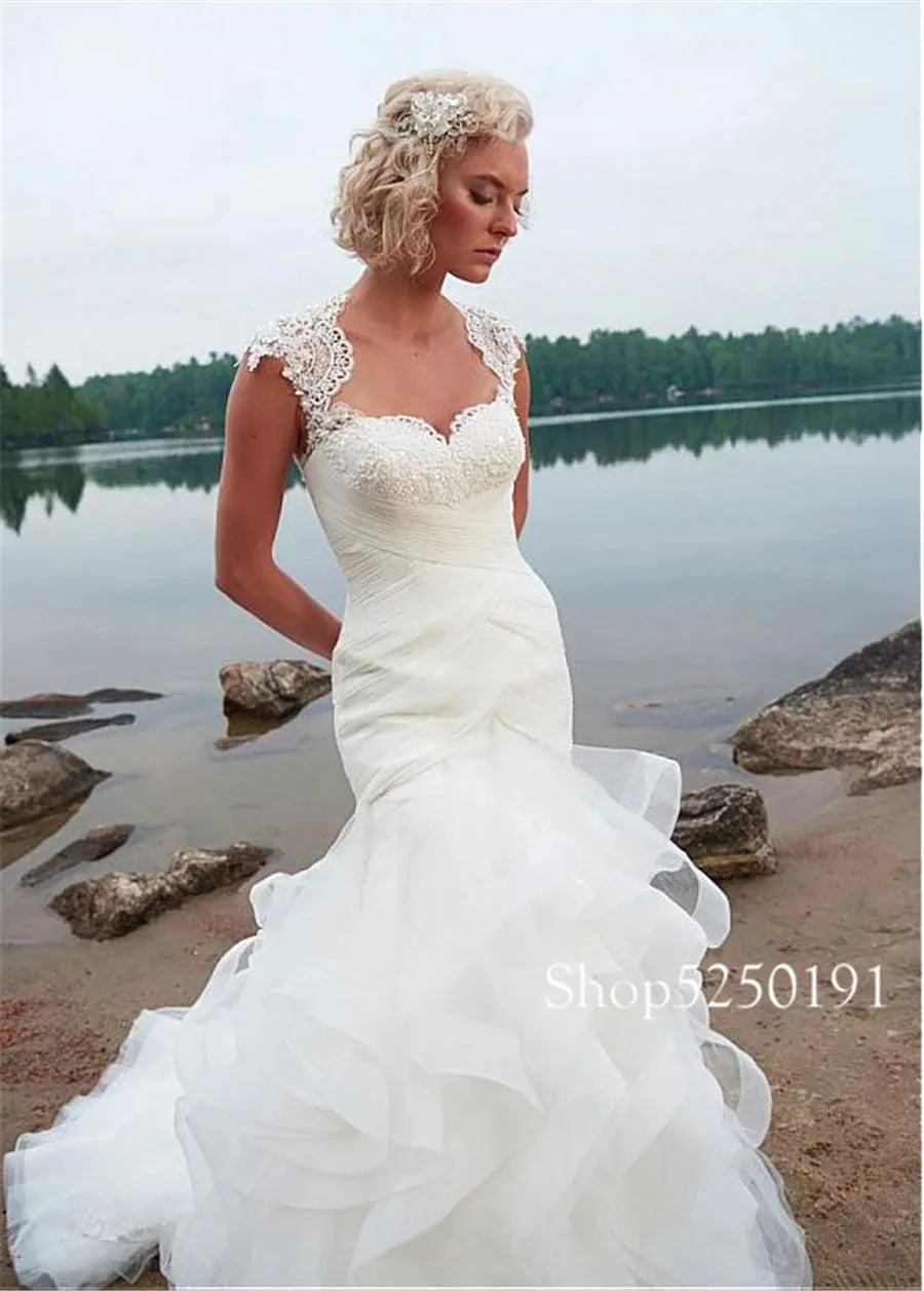 Exquisite Crisscross Ruched Bodice Sweetheart Neckline Mermaid Wedding Dress Cap Sleeves Ruffled Organza Beach Bridal Gowns