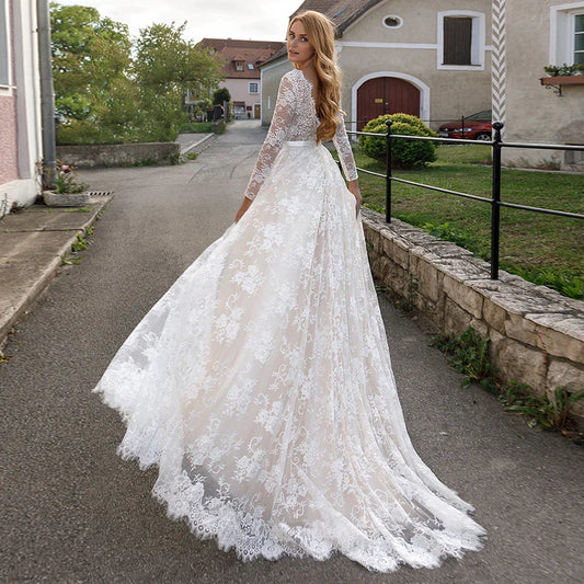 Elegante volle Spitzen-Champagner-Brautkleider sexy V-Ausschnitt Illusion Langarm Boho Beach Brautkleid Rückenlose Ehe