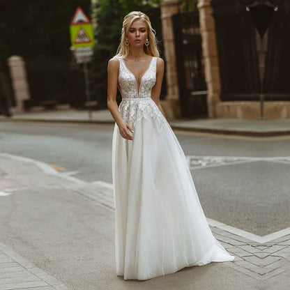 Robes de mariée en dentelle ivoire Boho, ligne A, sans manches, avec des Appliques, Sexy, col en V, robes de mariée bouffantes en Tulle 