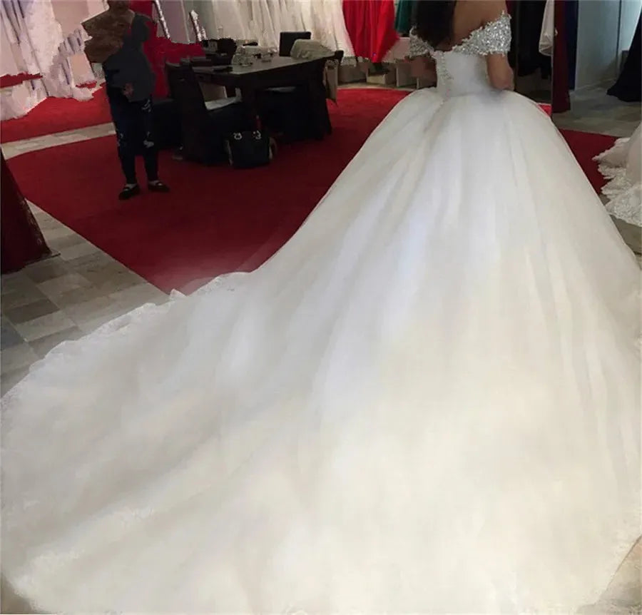 Off Shoulder Short Sleeves Ball Gown Wedding Dresses 2020 Sexy Beaded Crystal Chapel Train Bridal Gowns Formal WHITE