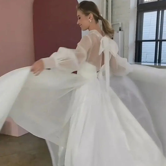 Anmutig eine Linie Hochzeitskleid Langer Puffärmel hoher Hals -Brautkleid Strand Einfacher Bodenlänge Rücken mit Bopw Mitte hergestellt