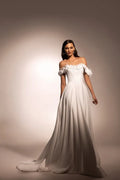 Chic A-Line Wedding Gown with Boat Neckline, Dropped Straps, and Button Embellishments Satin