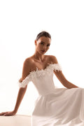 Chic A-Line Wedding Gown with Boat Neckline, Dropped Straps, and Button Embellishments Satin