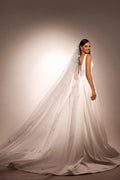Sophisticated A-Line Wedding Gown with Deep Neckline, Sleeveless Design, and Button Embellishments Satin