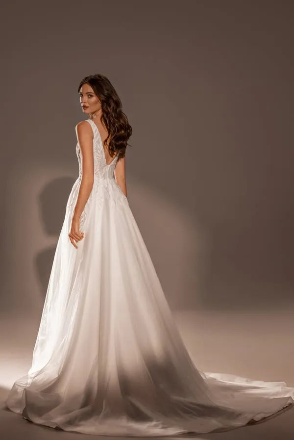 Graceful A-Line Wedding Dress with V-Neckline, Sleeveless Design, and Lace Embellishments Satin