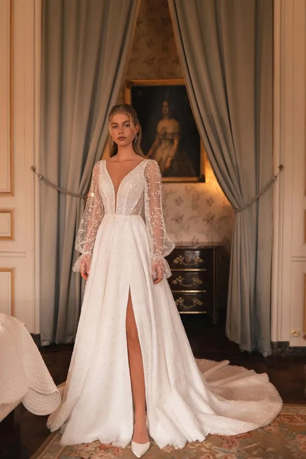 Elegant A-Line Wedding Gown with Puff Sleeves, Deep Neckline, Sequin Embellishments, and a Natural Waistline for a Timeless Bridal Look Satin