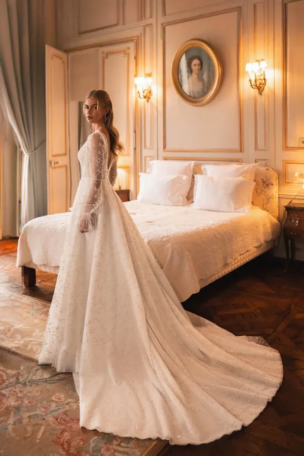 Elegant A-Line Wedding Gown with Puff Sleeves, Deep Neckline, Sequin Embellishments, and a Natural Waistline for a Timeless Bridal Look Satin