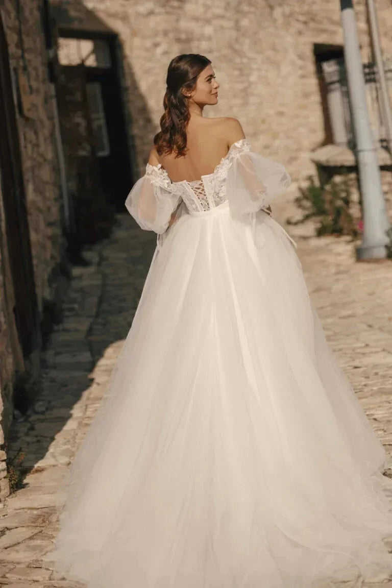 A-Line Wedding Gown with Puff Sleeves, Off-Shoulder Neckline, Glitter Embellishments, and Natural Waistline Satin