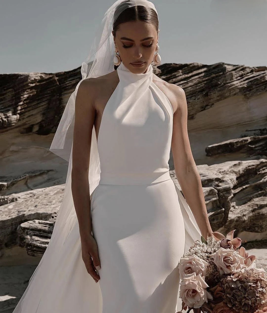 Abito da sposa in spiaggia Halter con velestra