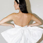 Elegante kurze Hochzeitskleider trägerloser ärmellose Brautkleider mit großem Bogen Mini Prom Cocktailkleid mit Taschen
