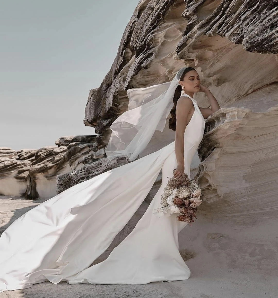 Abito da sposa in spiaggia Halter con velestra