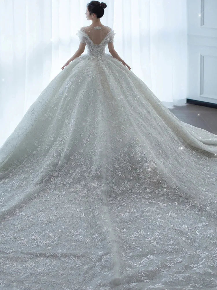 D120 Prinzessin Sexy Luxus Kristall Perlen Hochzeitskleid Puff Tüll weiße Hochzeitskleid Einfache Braut Kleid Frauen