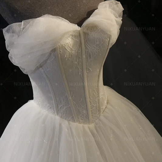Kincesja Lace Tiul A Line Suknia ślubna ukochana z aplikacji na ramię boho suknie ślubne dla kobiety vestidos de novia