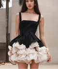 Elegant Black Mini Dress with Peplum and White Ruffle Accents for Upscale Casual Gatherings