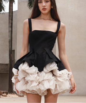 Elegant Black Mini Dress with Peplum and White Ruffle Accents for Upscale Casual Gatherings