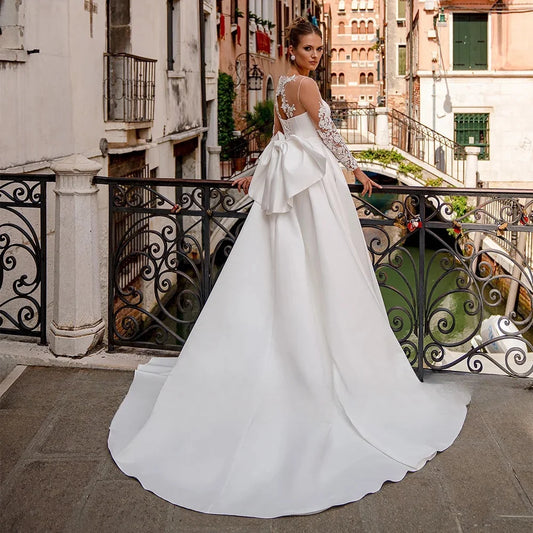 Vestido de novia de satén elegante para novia, manga larga transparente, cuello redondo, apliques en la espalda, vestido de novia con corsé con lazo grande, diseño de línea A