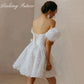 Mini robe de mariée courte en dentelle, manches bouffantes, col carré, ligne A, dos nu, à lacets