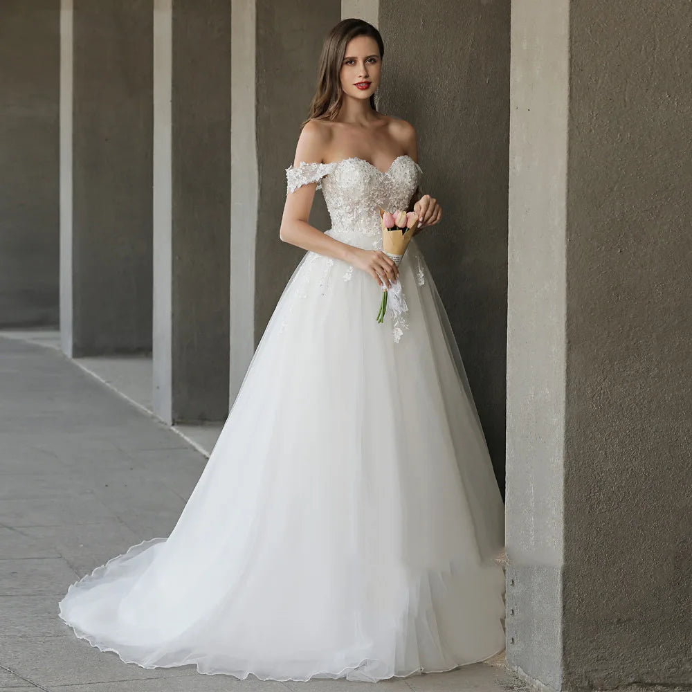 Vestido de noiva de tule gracioso Uma linha, namorada, aplica -se ao ombro vestido de casamento feito sob medida