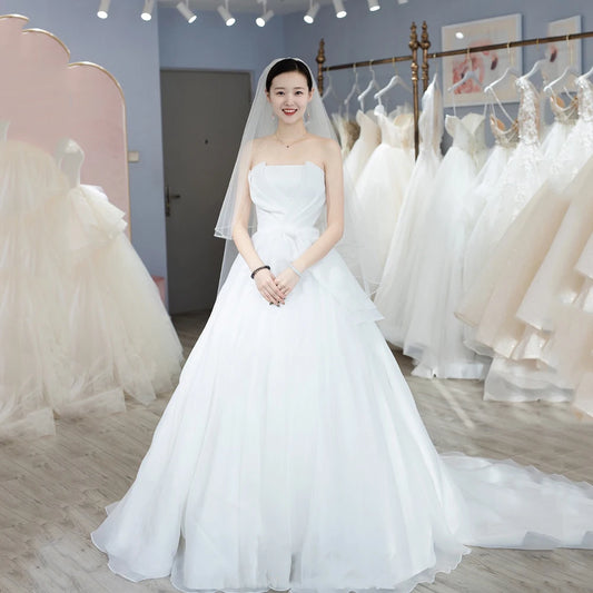 Vestidos de novia blancos de lujo, sencillo y agradable arco, sin tirantes, para boda, elegante, largo y delgado, vestido largo Formal de noche para mujer