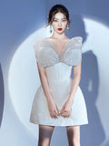 Glamorous White Strapless Mini Dress with Sparkling Butterfly Detailing for a Gala Event