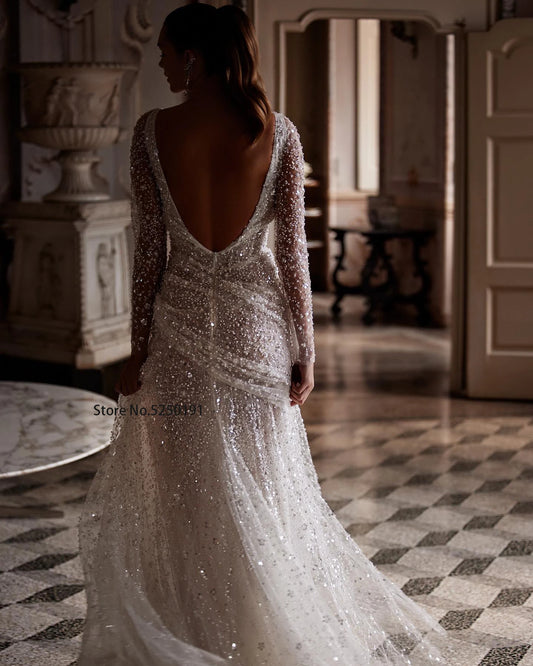 Stunning Beaded Sequined Long Sleeves V-neck Mermaid Wedding dresses Side Slit Backlesss Sexy Custom Made 2024 Rode De Morrie