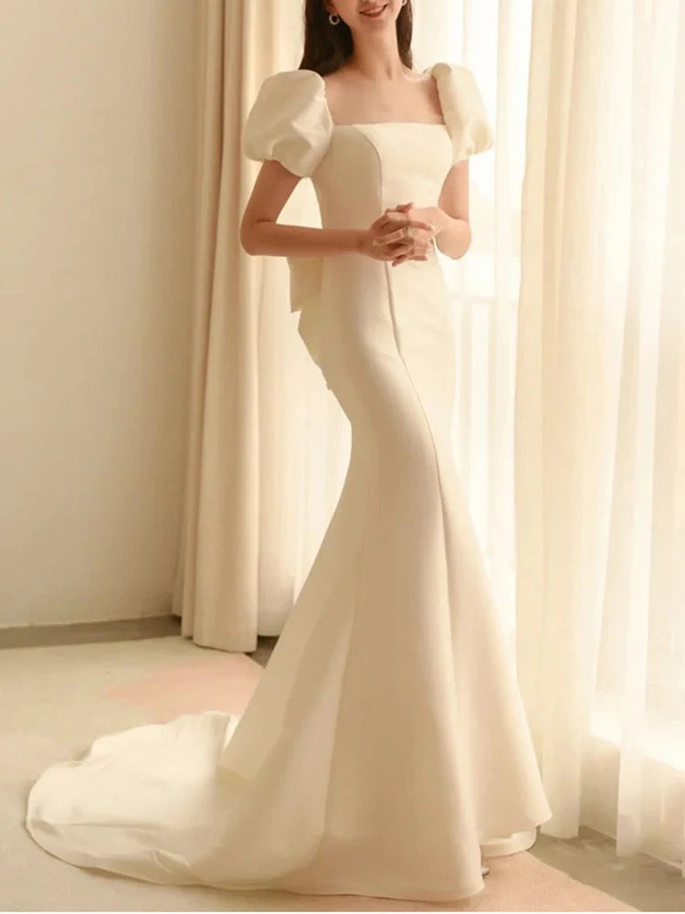Luxus weißer Satin Hochzeit Meerjungfrau nachlaufende Kleider für Braut Frauen elegant Vintage Rückenless Big Bow Long Party Kleid Maxi