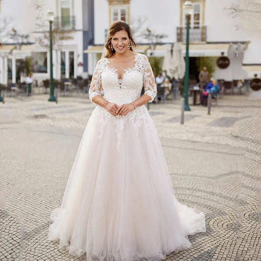 Exquisitos vestidos de novia Tamaño Plue Cuello en V Mangas 3/4 Vestidos de novia Apliques Ilusión Tren de barrido Tul Una línea Robe De Mariée 