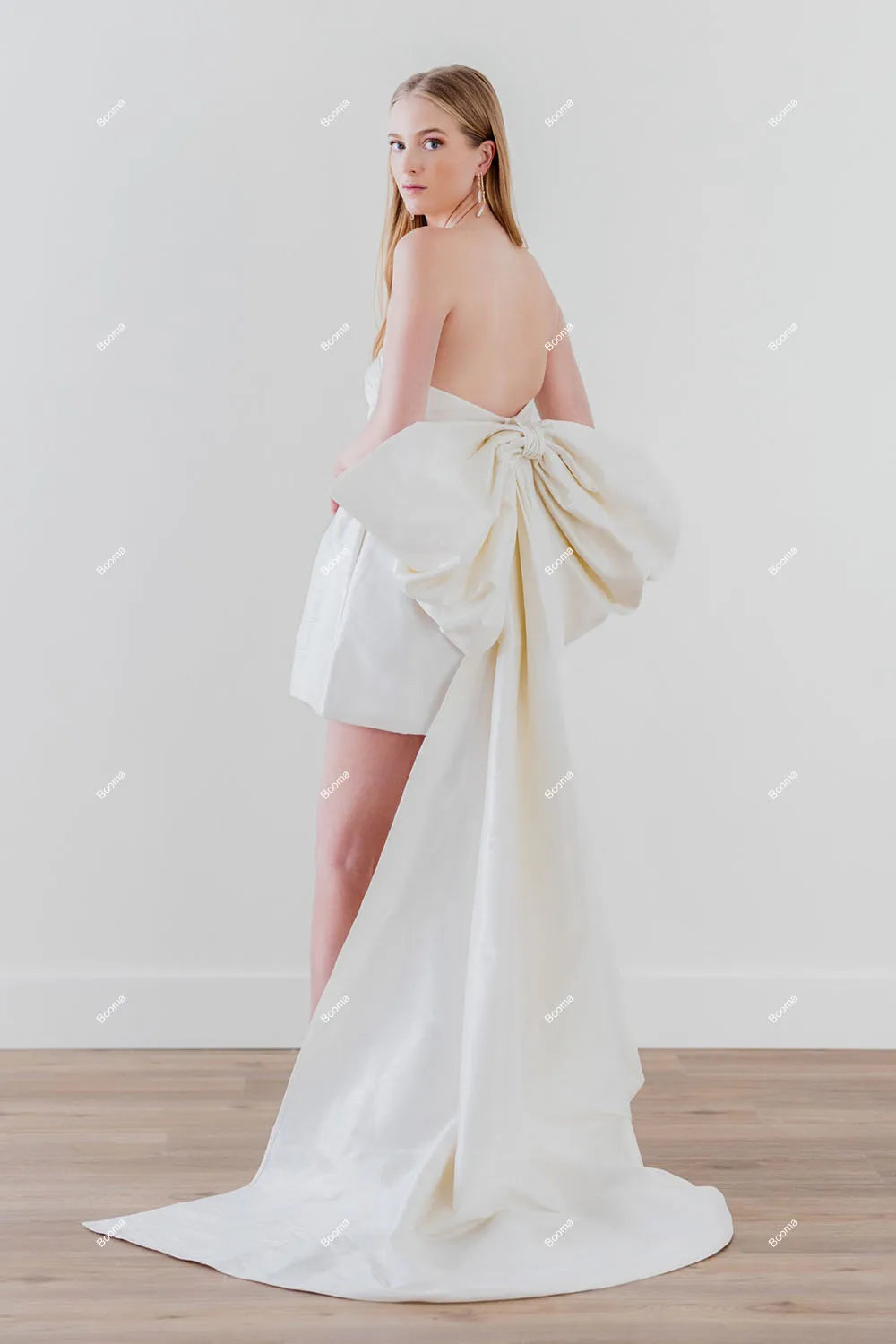 Gaun pengantin pendek yang elegan gaun pesta bridal tanpa lengan dengan busur besar mini prom gaun koktail dengan kantong