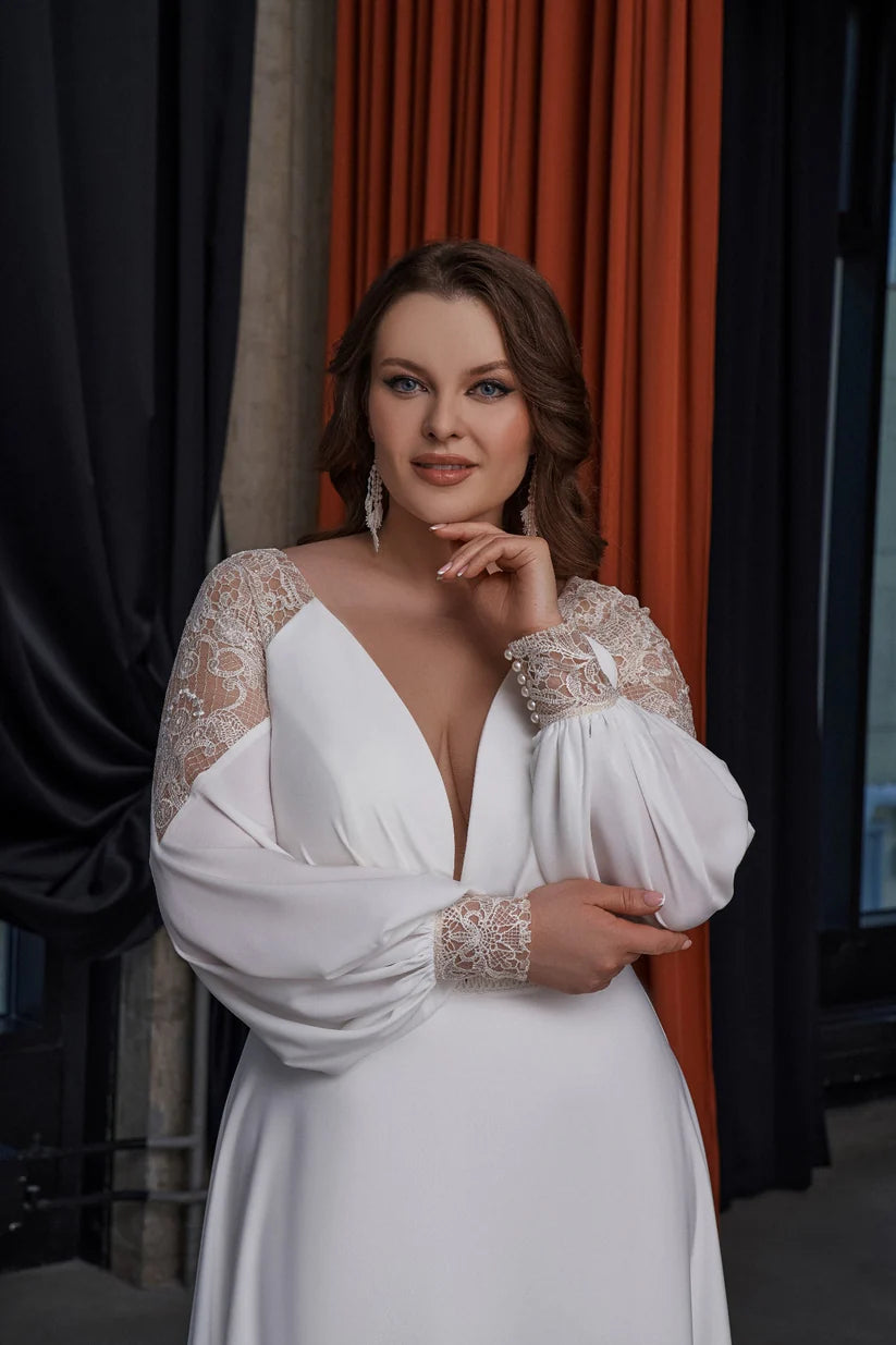 Bescheidene bodenlange Hochzeitskleider für Braut Plus Size Brautkleid mit langen Ärmeln gegen Nacken mit Spitzen -Sweep -Zug Mono