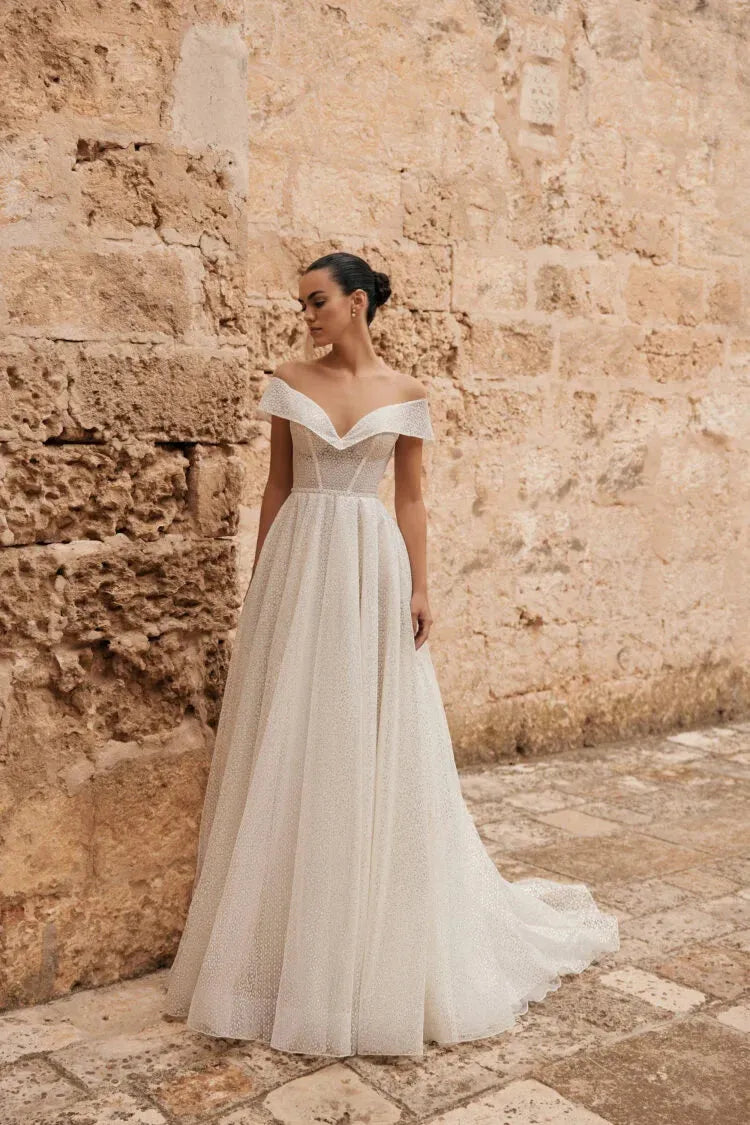 Vintage A-Line Wedding Gown – Strappy Illusion Neckline with Sequin Embellishments and a Natural Waistline for a Timeless Bridal Look Satin