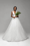 Beautiful Puffy A-Line Wedding Dress with Straps, V-Neckline, and Lace Embellishments for a Stunning Bridal Look Satin