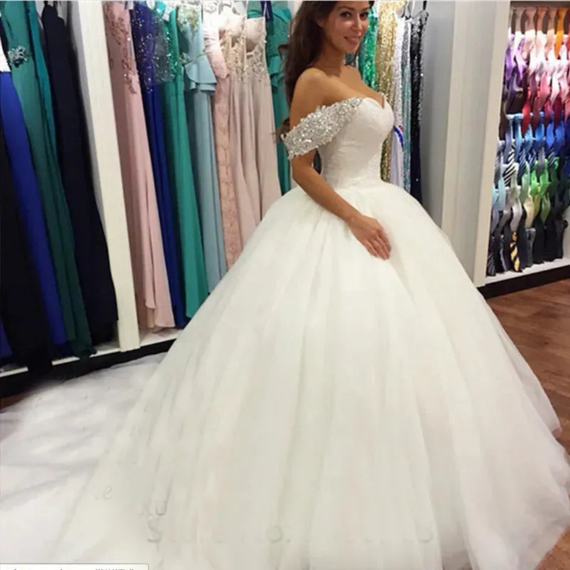 Off Shoulder Short Sleeves Ball Gown Wedding Dresses 2020 Sexy Beaded Crystal Chapel Train Bridal Gowns Formal WHITE