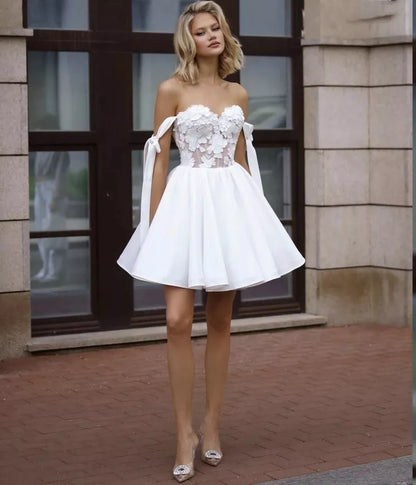 Eleganti abiti da sposa corti Abiti in pizzo a-line fuori dalla spalla Abito da sposa aperto in raso sopra il ginocchio Vestidos de Noiva