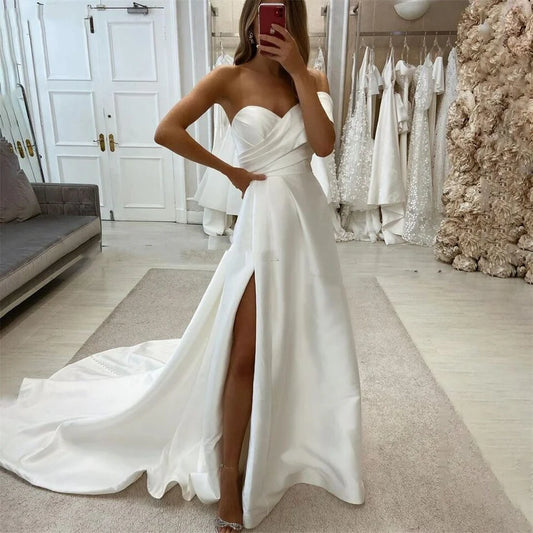 Vestidos de novia lisos de lujo, un hombro con abertura lateral, satén, corte en A, vestido de fiesta de noche, vestidos de novia plisados ​​brillantes con hombros descubiertos 